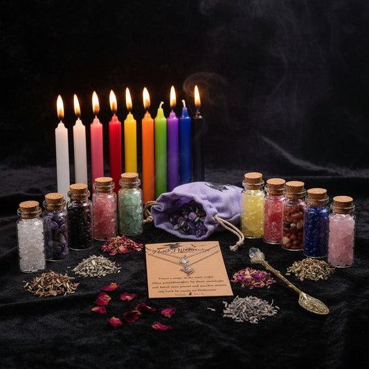 Witch starter kit with candles, stones, and other items on a white background