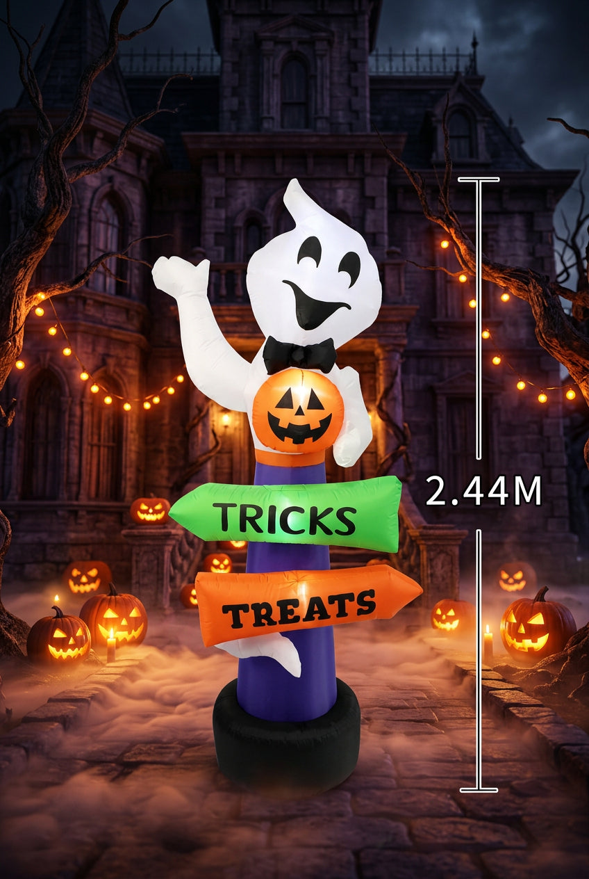 Inflatable Halloween ghost decoration with a smiling white ghost, black bow tie, orange jack-o'-lantern, and directional signs reading 'TRICKS' and 'TREATS' on a purple pole, shown with a 2.44 M height marker on a white background.