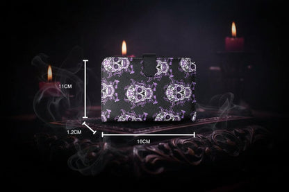 A product dimension diagram showing a black PVC wallet case with a purple sugar flower skull pattern, labeled with measurements of 16cm width, 11cm height, and 1.2cm thickness, with a specification table below.