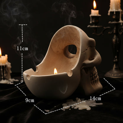 Skull-shaped decorative item with measurements on a white background