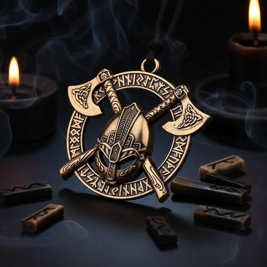 Bronze pendant with axes and helmet design on a black background