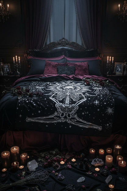 A black blanket featuring a white graphic print of a skeleton meditating in front of a sun and moon phases, shown flat against a white background.