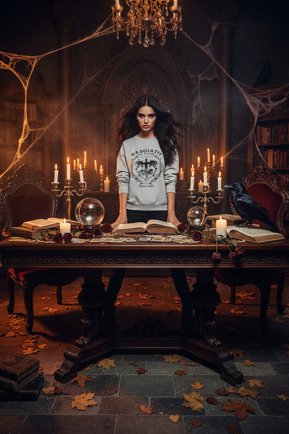 Two gray sweatshirts with black designs on a light gray background