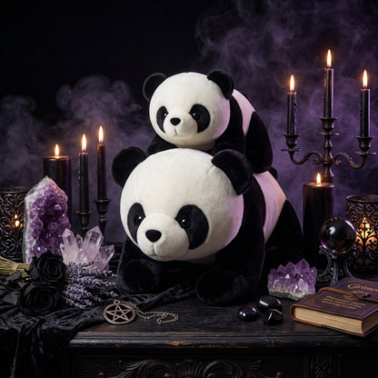 Woman holding a large panda plush toy in a room with a couch and decorative items.
