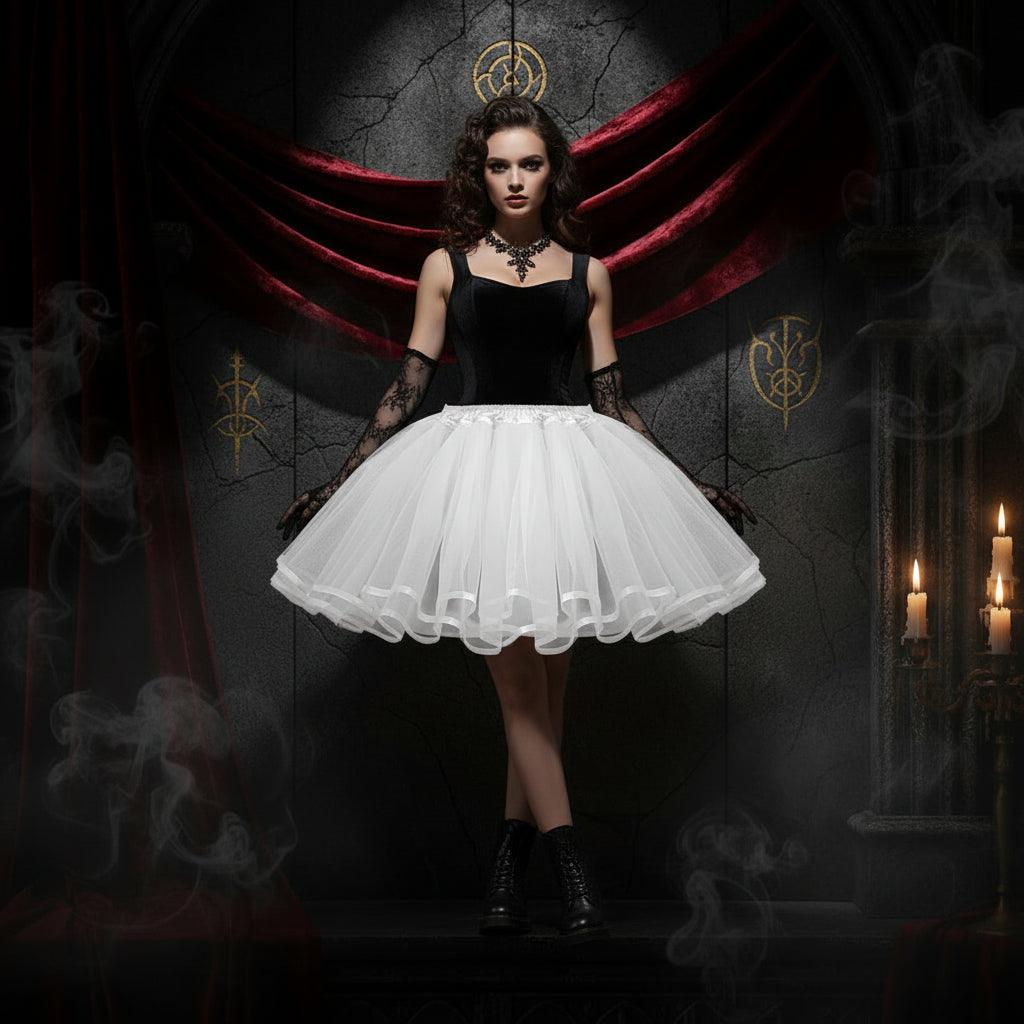 A white tulle tutu skirt with a gathered elastic waistband, displayed against a solid white background.