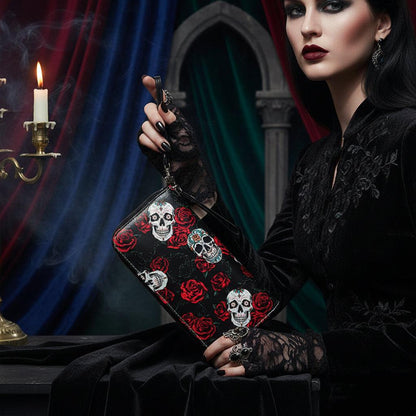Black clutch bag with skull and rose pattern on a white background