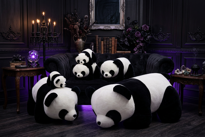 Collection of panda plush toys on a couch and floor.