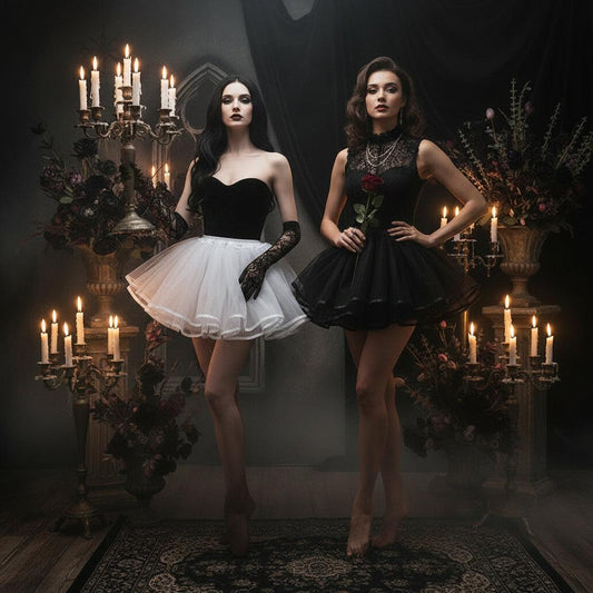 Two tutu skirt mannequins in a bright room. One mannequin wears a white tulle tutu skirt, and the other wears a black tulle tutu skirt.