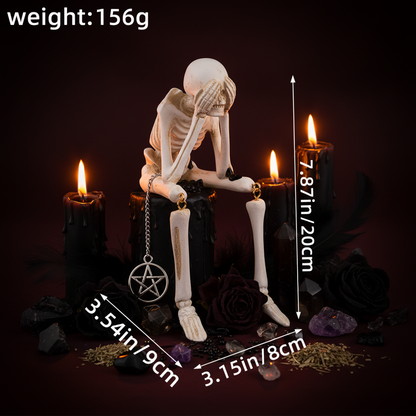 A seated skeleton figurine on a plain white background with overlaid dimension arrows and text showing weight 156g and measurements in centimeters and inches.