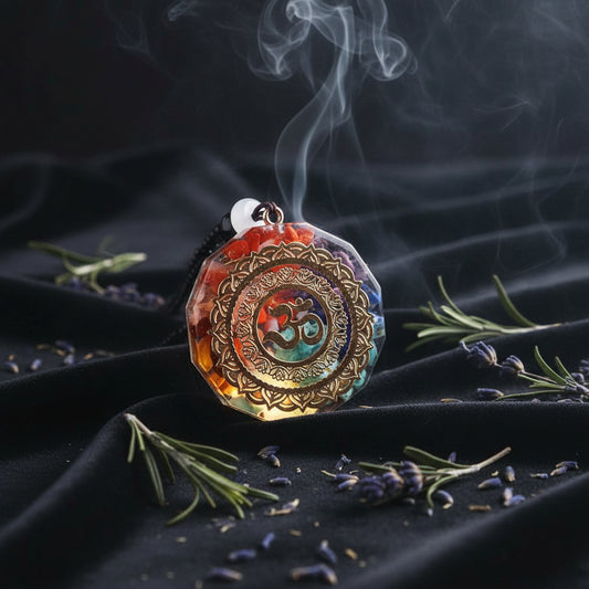 Decorative pendant with Om symbol on a white background