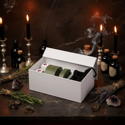Green bath bombs and black socks in a white box with a purple label.
