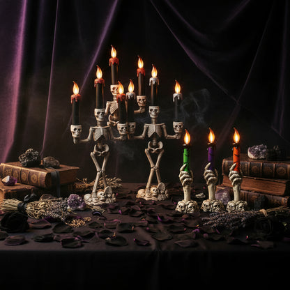 Skeleton candle holder with colorful candles on a white background