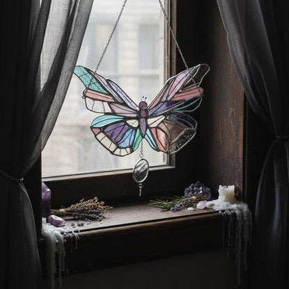Stained glass butterfly hanging decoration on a white background