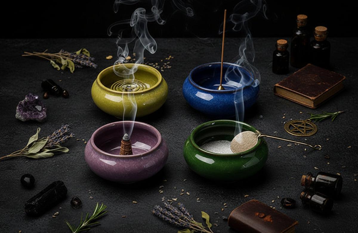 Four ceramic incense burners in different glaze colors: olive green, deep blue, mauve purple, and forest green, arranged in a 2x2 grid on a white background.