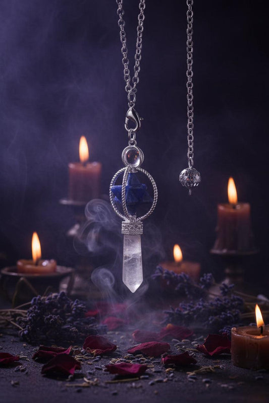 Jewelry pendant with blue gemstone and clear crystal on a black background