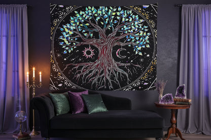 Tree of life tapestry with celestial elements on a wall above a bed.