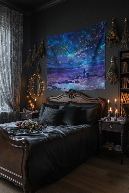 Tapestry with a cosmic scene of two people on a beach under a starry sky.