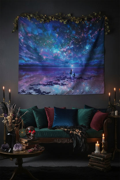 Wall tapestry with a cosmic design hanging on a white brick wall.