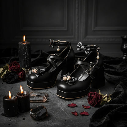 Black high-heeled shoes with bow details worn by a person on a neutral background