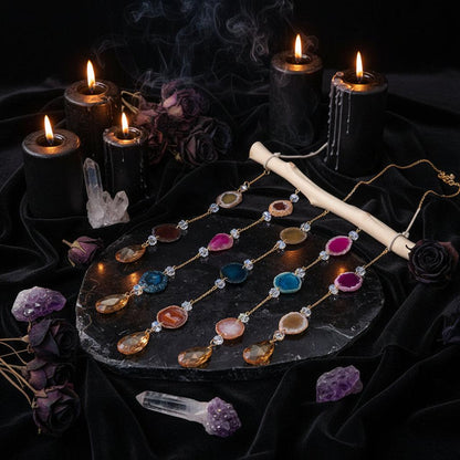 Necklace with colorful gemstones on a wooden surface