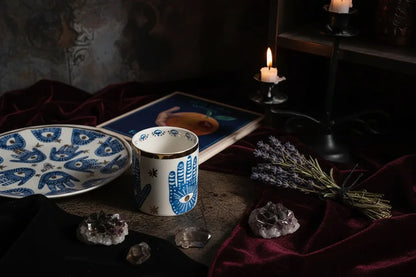 Nordic Evil Eye Tableware - Sorceress Sanctuary Figure / Small eye jar-Figure / Handprint Cup and Saucer-Figure / Handprint 8 inch disc-Figure / Eyes 8 inch plate-Figure / Eyes 10 inch plate