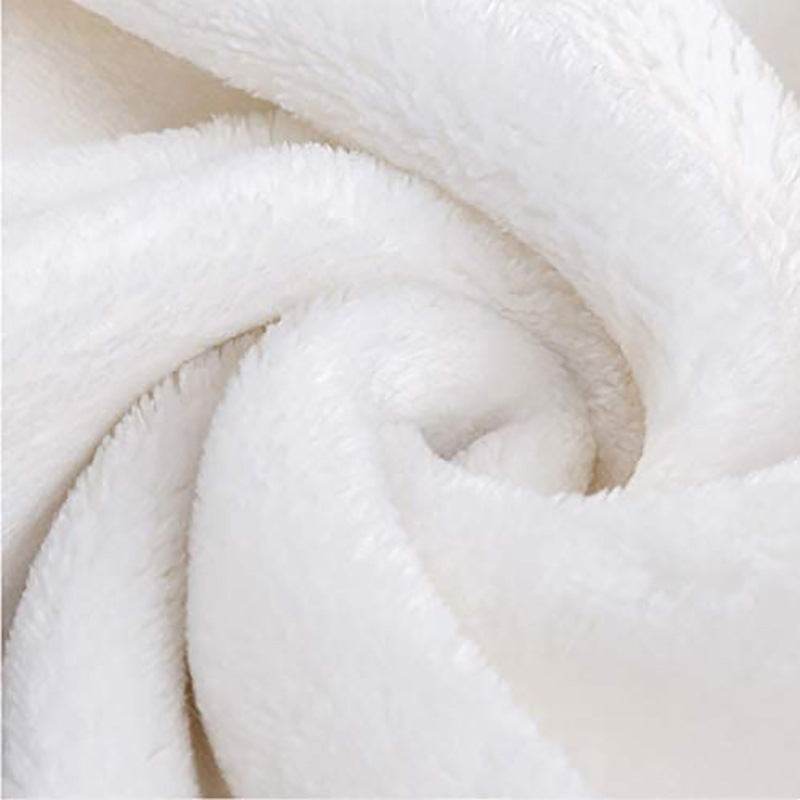 Close-up of white fleece fabric with a soft texture