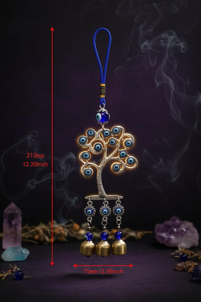 Tree-shaped decorative hanging with blue eyes and bells, shown with measurements on a white background.