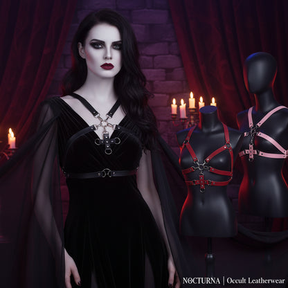 Black leather harness with metal clasp on a mannequin bust, with additional designs in red and pink shown below.