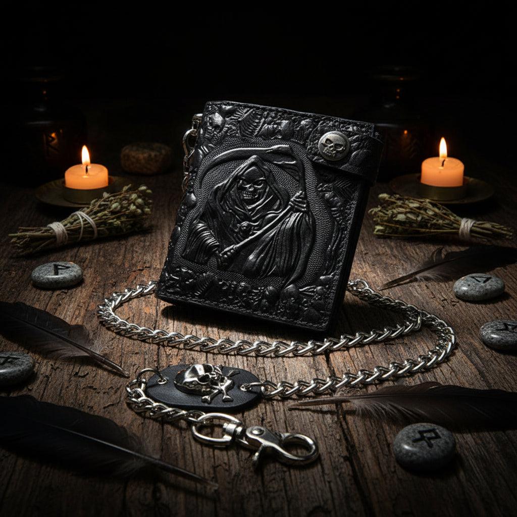 Black embossed wallet with chain held by a hand on a white background