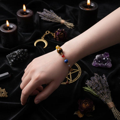 Colorful beaded bracelet on a wrist against a white background