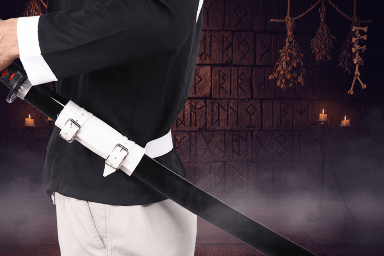 Person holding a sword with a white belt against a light gray background