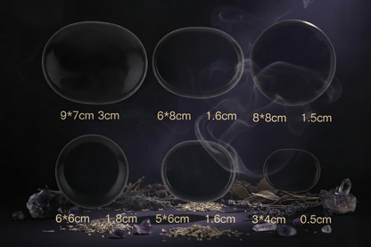 Set of black round stones with dimensions labeled below each stone on a white background.