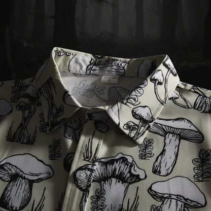 Shirt with black mushroom pattern on a light background
