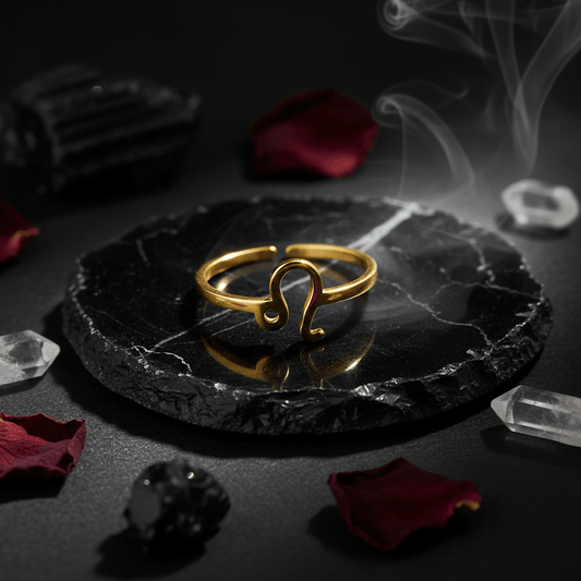 Gold ring with a unique design on a white background
