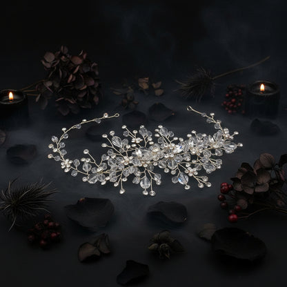Delicate hair accessory with pearls and crystals on a white background