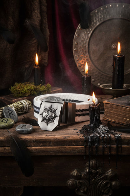 White belt with black stripes and a silver buckle on a wooden surface