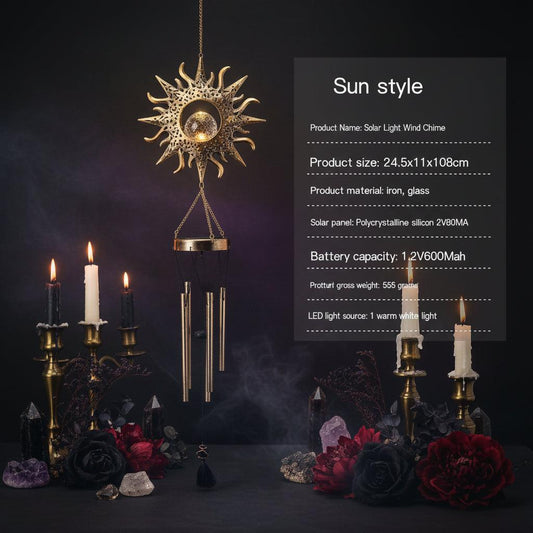 A sun-shaped wind chime with hanging metal tubes and a small circular center detail, shown next to printed product specifications on a white background.