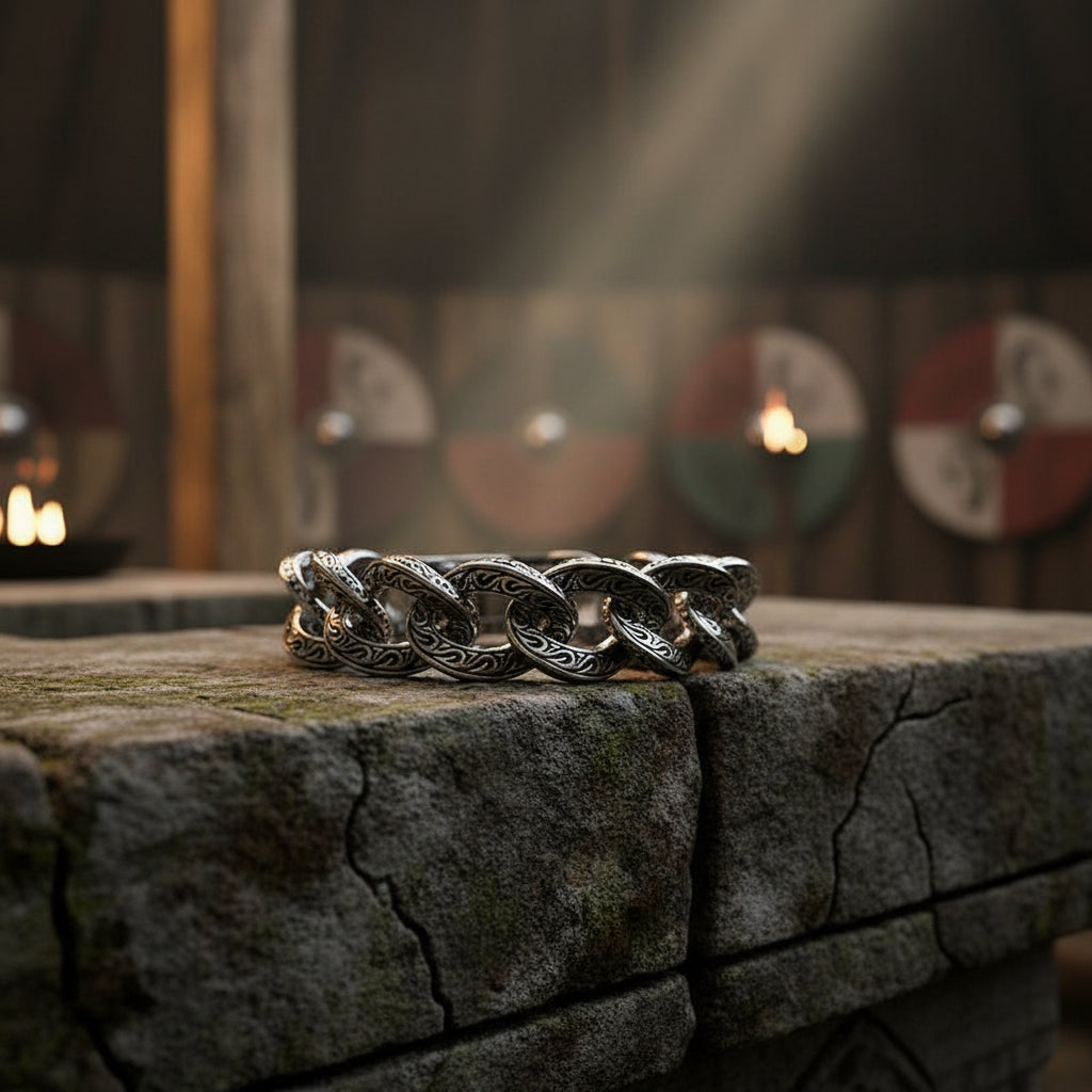 Silver chain bracelet on a dark background