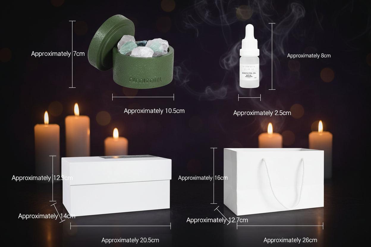 Product packaging and item dimensions diagram showing a small round green crystal holder with crystals, a white dropper bottle, a white box, and a white gift bag with measurement labels on a light gray background.