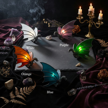 Five dragon wing color options labeled White, Purple, Orange, Green, and Blue, shown on a plain white background.
