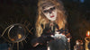 psychic witch looking into crystal sphere 